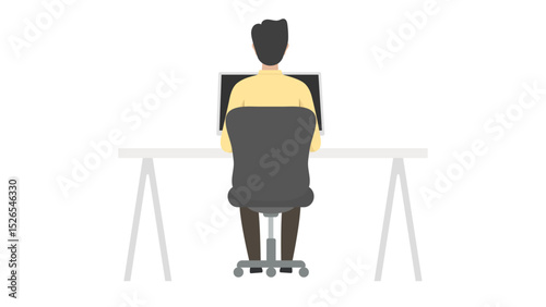 A man viewed from behind sits on an office chair at a desk, working on a computer