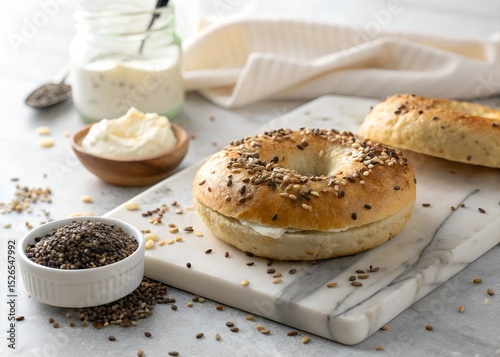 Delicious Everything Bagel with Cream Cheese on Marble Board