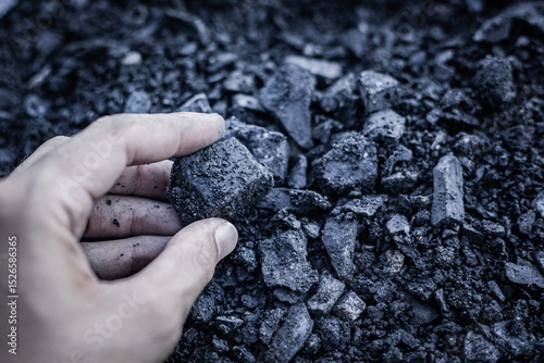 coal in the hand. Coal in the Hand of Miners. Mining Industry Concept. Heavy Industry. Heating. Mineral Raw Materials. Natural Resources