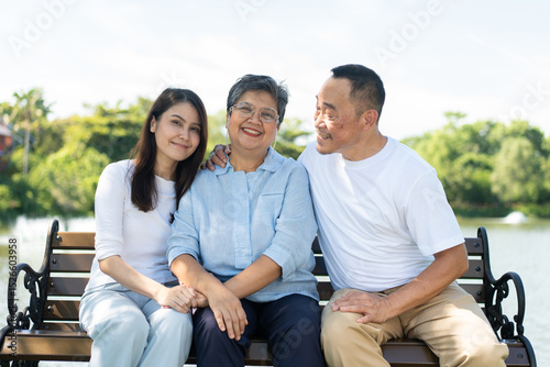 Daughter lovingly supports her elderly mother, capturing a beautiful family portrait filled with happiness and care. Their strong relationship creates cherished memories, celebrating warmth of family