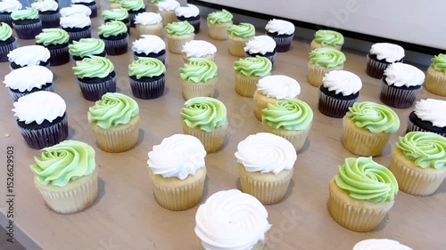Assorted Cupcakes with Swirled Frosting on Display