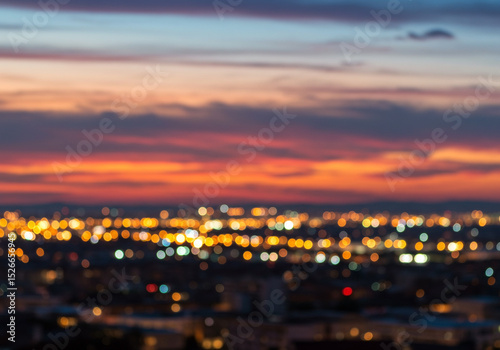 Serene Cityscape Sunset Bokeh Lights Blurred Urban Twilight Evening Panorama View