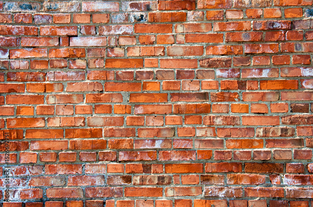 Naklejka premium Old rough brick wall. Grunge background
