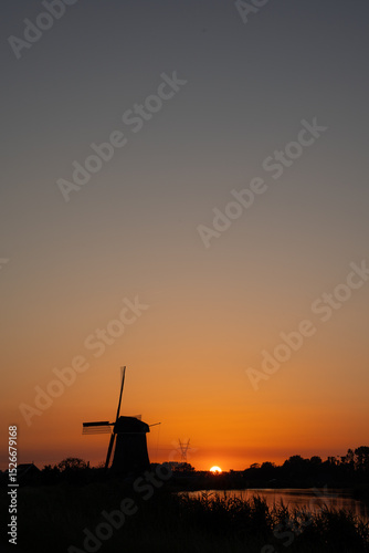 Dutch windmill in sunset