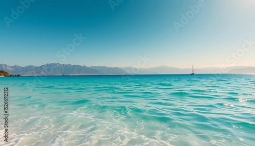 Sun-drenched beach, turquoise water, majestic mountains in the distance, holiday, travel