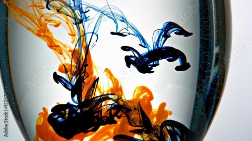 Abstract Colorful Ink Swirls in Water Orb A Mesmerizing Fluid Dynamics Photography