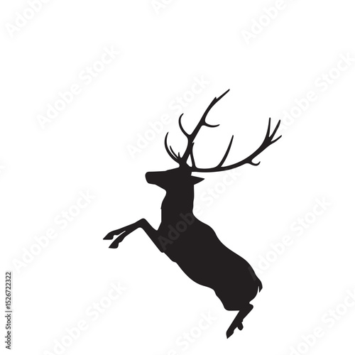 Majestic silhouette of a leaping deer with antlers