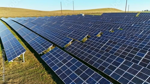 Aerial View of Extensive Solar Panel Farm Generating Clean Energy