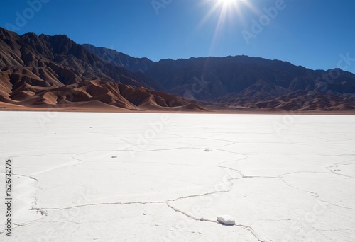 Sun-baked salt flats, stark mountains, Death Valley's desolate beauty,   nevada desert,  dry
