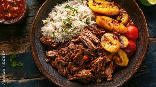 Flat lay of Cuban ropa vieja with rice and fried plantains, rustic Cuban setting, deep reds and yellows