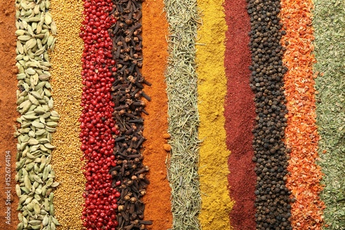 Fototapeta Naklejka Na Ścianę i Meble -  Many different spices as background, top view
