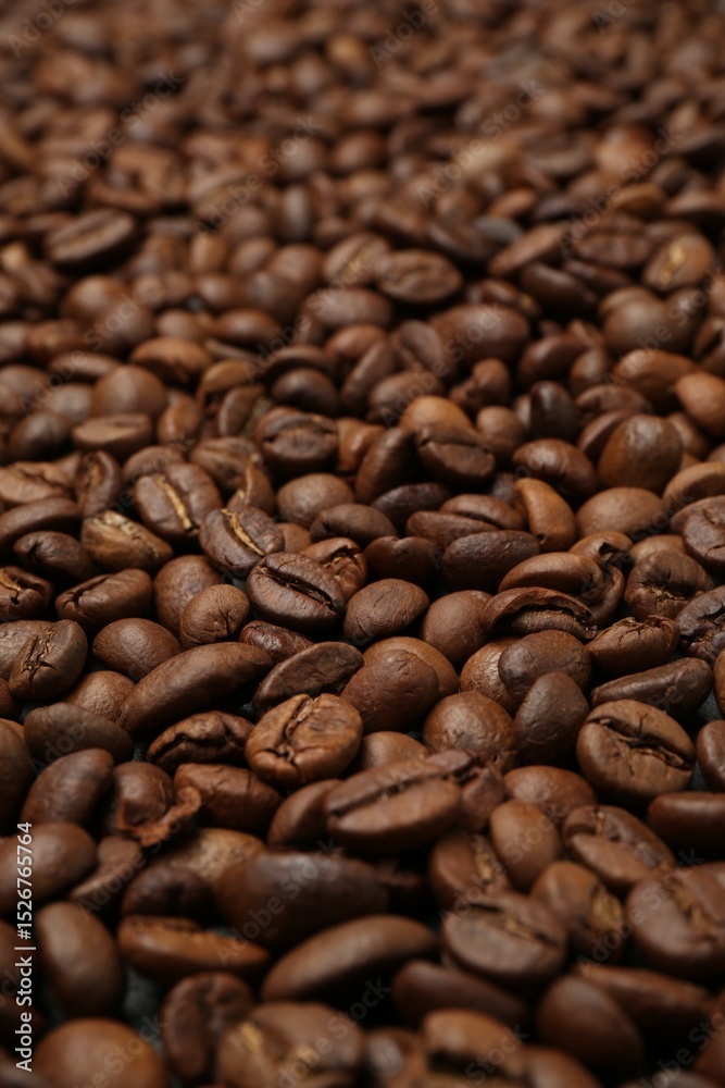Naklejka premium Aromatic coffee beans as background, closeup view