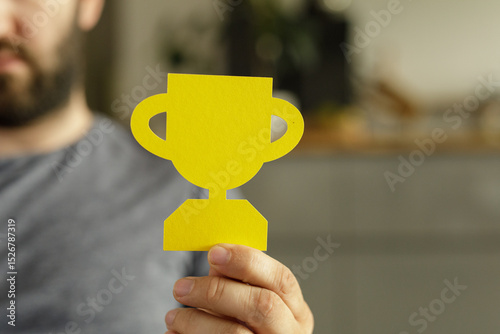 Close-up of a man holding a...