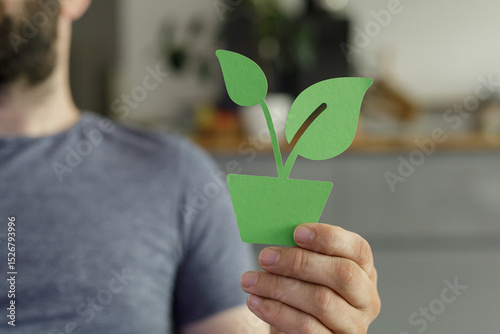 Image of a person holding a...