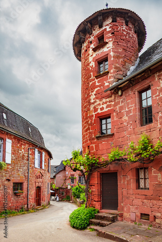 Fototapeta Naklejka Na Ścianę i Meble -  Collonges-la-Rouge, listed in Les Plus Beaux Villages de France, Most Beautiful Villages in France, red sandstone village, picturesque narrow alleys and stone houses, France, Correze, Dordogne valley