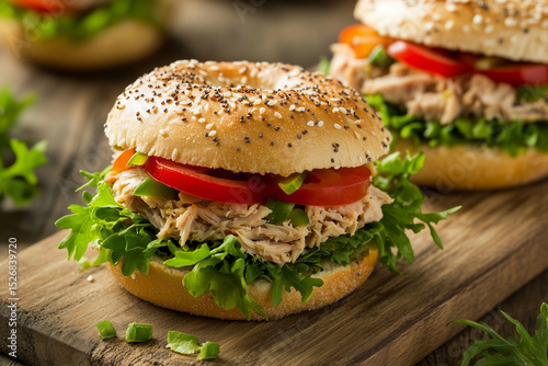 Fresh Bagel Sandwich Filled with Tuna Salad and Crisp Lettuce