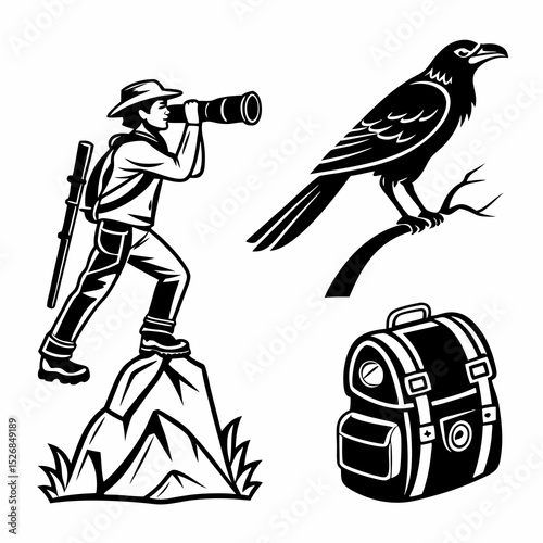 Wildlife photographer on mountain peak with backpack and raven