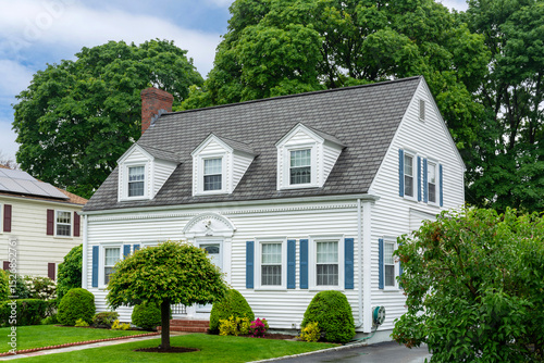 Elegant Colonial Revival home surrounded by lush greenery in Newton, Massachusetts, USA
