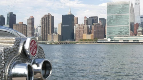New York City waterfront skyline, Manhattan Midtown buildings, riverfront skyscrapers by East river water. Waterside cityscape, tower viewer, Gantry Plaza. Long Island, Queens. United States tourism.