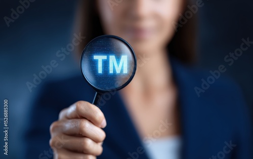 Woman examines trademark through magnifying glass. Intellectual property search, business lawyer, registration research, legal symbol protection.