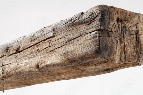 Old wood beam shows its age. Weathered timber, ancient lumber, construction material, rustic, lumber, building.