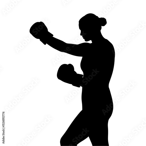 Female boxer training with gloves in silhouette pose  