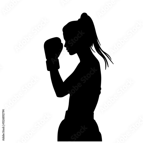 Female boxer in silhouette stance preparing to spar  