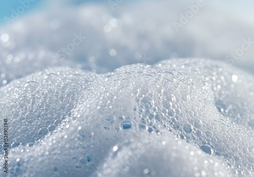 Close-up of Sparkling White Soap Suds Bubbles Texture for Backgrounds and Cleaning Products