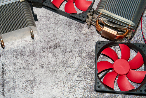 From above of vintage red CPU cooler also called PC cooling fan placed on surface