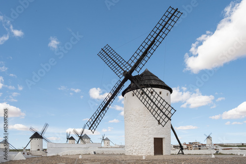 Historic windmills in Campo de Criptana, Castilla-La Mancha, Spain. These iconic structures, famously linked to Don Quixote, are a symbol of Spanish heritage. photo