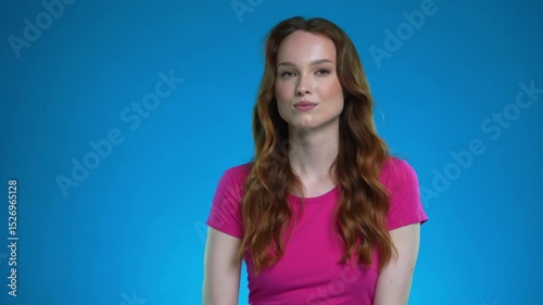 Woman expresses deep emotion in studio setting during beauty shoot