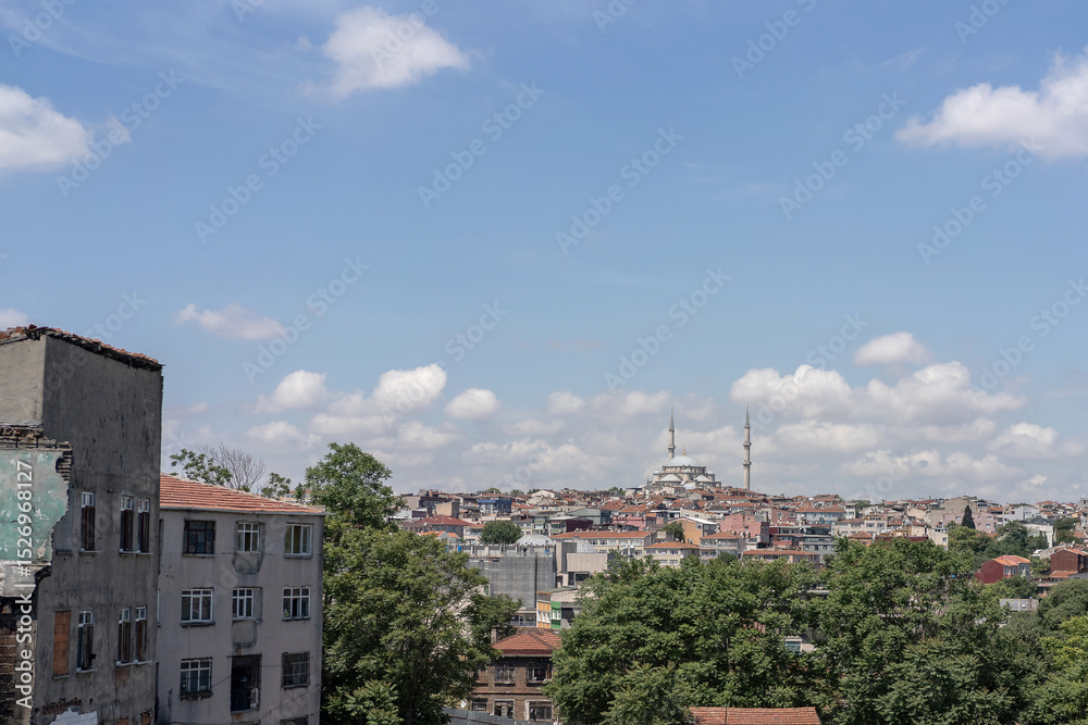 Fototapeta premium cityscape of Istanbul, Turkey, view to architecture of city against the sunset sky, a popular tourist destination