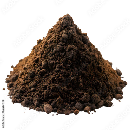 Freshly ground coffee powder pile isolated against a solid black background in detail