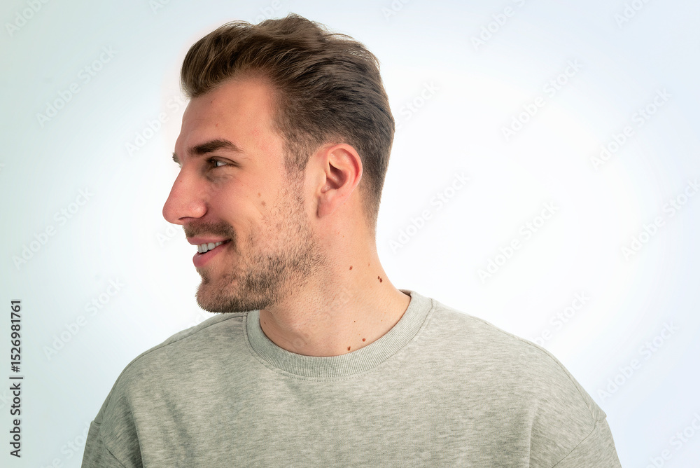 Fototapeta premium Headshot of a young man standing against isolated background
