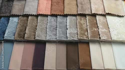 Furniture textiles for the interior of the house. Samples of soft upholstery fabrics. a close-up view of the catalog. a cozy collection of velour and boucle textile fabrics for furniture