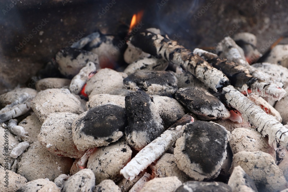 Close-up of coals in the grill, fire, smoke Close-up of coals in the grill, fire, smoke