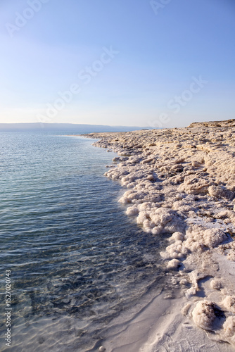 Wallpaper Mural Visit the picturesque landscape of the Dead Sea in Jordan where salt formations line the shore, creating a unique and beautiful view under the sunny sky Torontodigital.ca