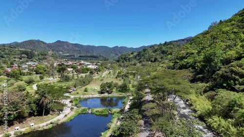 Wallpaper Mural Scenic flight over ponds, forest and mountain backdrop in Bajo Boquete Panama Torontodigital.ca