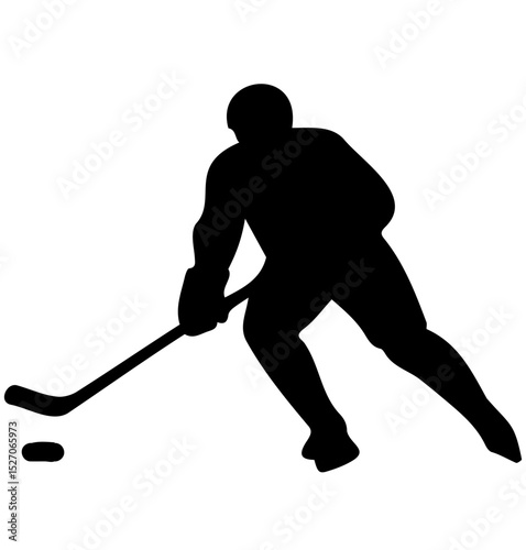 Silhouette of hockey player in action, holding stick and approaching puck