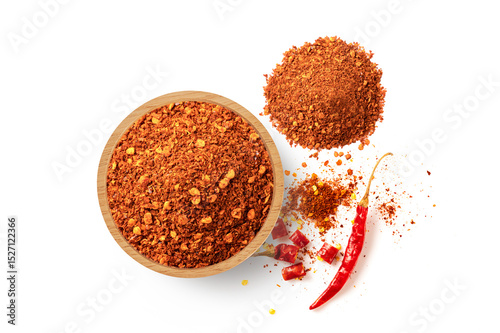 Fototapeta Naklejka Na Ścianę i Meble -  Red chili pepper in wooden bowl  with red pepper flakes isolated on white background. Top view