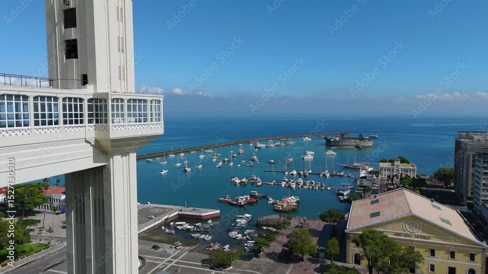 Aerial view of the historic Lacerda Elevator and Baia de Todos Santos on a sunny day in Salvador, Bahia, Brazil.
