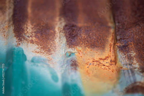 Rusty corrugated iron roofing, close-up.