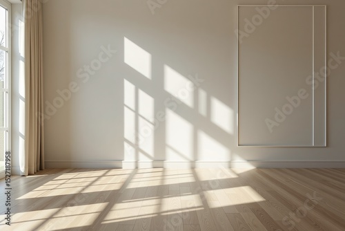 Sunlight streams through a large window, casting geometric shadows on the wooden floor of a bright, empty room with plain walls and a minimalist frame.