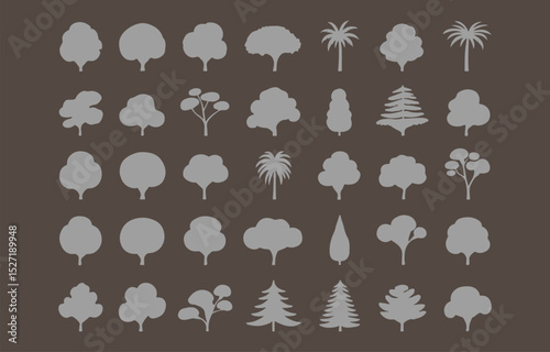 Collection of gray tree silhouettes on dark background