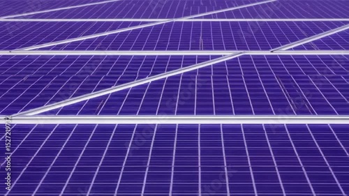 Solar Panels Array Under Clear Blue Sky at Sunset