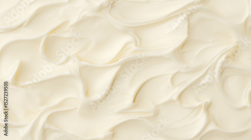 均一に広がったクリーム状の素材を明るく柔らかいトーンで表現。製菓や美容系コンテンツの背景に適したビジュアル。
