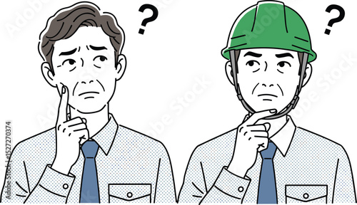 考える作業着男性