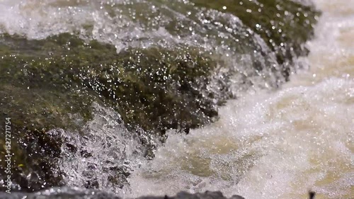 Wallpaper Mural A serene river flows powerfully through a lush, waters cascading down a mountain slope,Red flood water flows from the mountains, Nature of forests and red streams formed by the previous heavy rain Torontodigital.ca