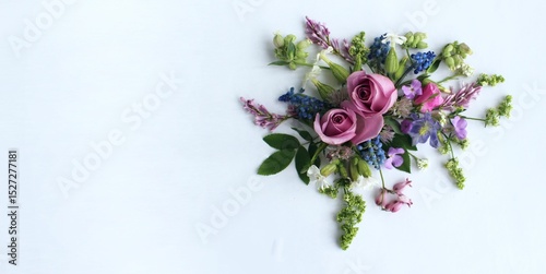 A composition of flowers on a white background. Spring pink flowers. Top view, a place to copy