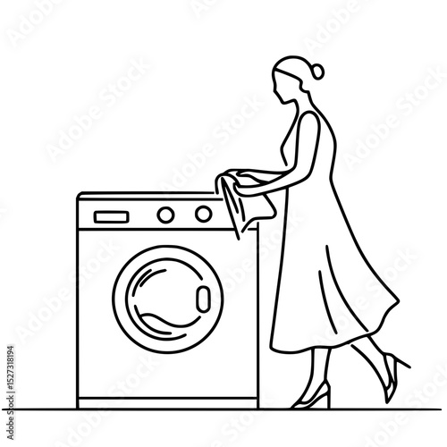 Woman placing clothes in washing machine in minimalist home design  
